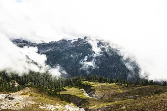 Fog rolling into the valleys of the Chain Lakes loop trail